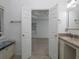 Stylish main bathroom features a granite countertop, tile flooring and doorway to the main bedroom at 2158 Berryhill Se Cir, Smyrna, GA 30082