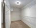 Large walk-in closet offers ample storage space with wire shelving and carpet flooring at 2158 Berryhill Se Cir, Smyrna, GA 30082