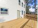 New wooden deck outside the home with access door to house and view of the back yard at 3170 Old Hwy 92 Dr, Acworth, GA 30102