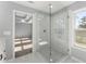 New bathroom with a glass shower and an open view to the main bedroom at 3170 Old Hwy 92 Dr, Acworth, GA 30102