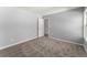 Neutral bedroom with carpet, open doorway and light grey walls at 3170 Old Hwy 92 Dr, Acworth, GA 30102