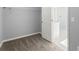Walk-in closet with shelving and an open view of the bathroom at 3170 Old Hwy 92 Dr, Acworth, GA 30102