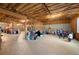 Unfinished basement with exposed beams and concrete floors, offering ample potential for customization at 1415 Swiftwater Cir, Mcdonough, GA 30252