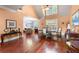 Spacious dining area features wood floors, vaulted ceiling, and a bright, open layout with plenty of natural light at 1415 Swiftwater Cir, Mcdonough, GA 30252