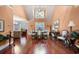 Spacious dining room with high ceilings, a large window, and elegant furnishings, perfect for entertaining at 1415 Swiftwater Cir, Mcdonough, GA 30252