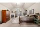 Bright main bedroom featuring a fireplace, sitting area, and lots of natural light at 1415 Swiftwater Cir, Mcdonough, GA 30252