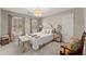 Cozy bedroom with natural light, stylish furniture, and elegant window treatments at 960 Whitehawk Trl, Lawrenceville, GA 30043