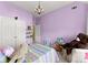 Bright bedroom featuring a chandelier and charming decor at 960 Whitehawk Trl, Lawrenceville, GA 30043