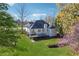 Expansive backyard with a spacious deck, perfect for outdoor entertaining and enjoying the serene surroundings at 115 Dearing Woods Way, Covington, GA 30014