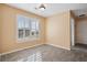 Sun-drenched dining area featuring tile floors, neutral paint, and large windows at 115 Dearing Woods Way, Covington, GA 30014