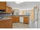 Functional kitchen with a tile floor and ample cabinet space at 115 Dearing Woods Way, Covington, GA 30014