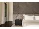 Bedroom detail with decorative wall, plush headboard, and modern nightstand, offering a stylish retreat at 31 Lafayette Ne Dr, Atlanta, GA 30309