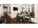 Cozy breakfast nook with a banquette, round marble table, and modern lighting fixture at 31 Lafayette Ne Dr, Atlanta, GA 30309