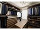 Walk-in closet with custom shelving and drawers for organized storage at 31 Lafayette Ne Dr, Atlanta, GA 30309