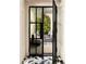 Entryway with modern glass door and stylish geometric flooring at 31 Lafayette Ne Dr, Atlanta, GA 30309