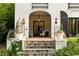 Inviting front porch showcasing a classic design with stone steps and elegant lighting at 31 Lafayette Ne Dr, Atlanta, GA 30309