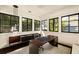 Bright home office with black-framed windows and a large desk at 31 Lafayette Ne Dr, Atlanta, GA 30309