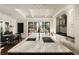 Elegant kitchen featuring a large marble island with stainless steel sinks and modern black-framed windows at 31 Lafayette Ne Dr, Atlanta, GA 30309