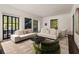 Bright living room with neutral sofas, and access to the outside at 31 Lafayette Ne Dr, Atlanta, GA 30309