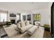 Bright living room featuring a fireplace, stylish decor, and an inviting seating area at 31 Lafayette Ne Dr, Atlanta, GA 30309