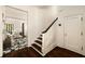 Traditional staircase with dark wood treads and white risers, leading to the upper level at 31 Lafayette Ne Dr, Atlanta, GA 30309