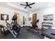 Well-equipped home gym features a variety of exercise machines and equipment at 5352 Lacosta Ln, Alpharetta, GA 30022