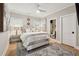 Cozy bedroom with a comfortable bed, windows, and an ensuite bathroom at 2583 Apple Valley Rd, Brookhaven, GA 30319