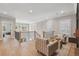 Open loft area with hardwood floors, railings, two chairs and stylish decor at 2583 Apple Valley Rd, Brookhaven, GA 30319