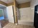 This bathroom features a shower and tub combination with white tile at 313 Ridge Hill Cir, Canton, GA 30115