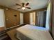 This bedroom features a ceiling fan and multiple closets at 313 Ridge Hill Cir, Canton, GA 30115