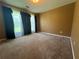 Bedroom featuring neutral carpeting and a large window allowing for lots of natural light at 313 Ridge Hill Cir, Canton, GA 30115