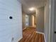 The hallway has wood floors and views of the other rooms at 313 Ridge Hill Cir, Canton, GA 30115