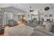 Inviting living room features vaulted ceiling, modern decor, and flows into the kitchen at 313 Ridge Hill Cir, Canton, GA 30115