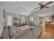Open concept living room with vaulted ceilings, wood floors, and neutral colored walls at 313 Ridge Hill Cir, Canton, GA 30115