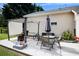 Outdoor patio area with a pergola, dining table, and seating at 313 Ridge Hill Cir, Canton, GA 30115