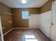 This room features wood-look floors, wainscoting, and lots of natural light at 313 Ridge Hill Cir, Canton, GA 30115