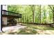 This backyard features a walkout patio, offering ample space for outdoor furniture and activities at 3612 Tree View Dr, Snellville, GA 30078