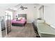Bright bedroom with desk area, dresser, and lots of natural light at 3612 Tree View Dr, Snellville, GA 30078