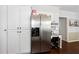 The kitchen features built-in cabinets, stainless steel appliances, and a desk area at 3612 Tree View Dr, Snellville, GA 30078