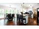 A bright kitchen and dining area with granite countertops and stainless steel appliances at 3612 Tree View Dr, Snellville, GA 30078