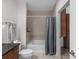 Modern bathroom with shower and tub combination featuring tile surround at 855 Peachtree Ne St # 1508, Atlanta, GA 30308