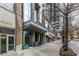Street view of building's stylish entrance and streetscape at 855 Peachtree Ne St # 1508, Atlanta, GA 30308