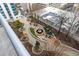 Overhead view of an outdoor courtyard with seating area and landscaping at 855 Peachtree Ne St # 1508, Atlanta, GA 30308