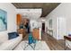 Open concept living space with kitchen featuring stainless appliances and hardwood floors at 855 Peachtree Ne St # 1508, Atlanta, GA 30308
