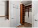 Organized walk-in closet featuring custom shelving for optimal storage at 855 Peachtree Ne St # 1508, Atlanta, GA 30308