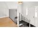 Inviting entryway with stylish black and white tile, light hardwood floors and white door at 1143 Morningside Ne Pl, Atlanta, GA 30306