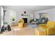 Bright living room with hardwood floors, a fireplace, and neutral colors at 1143 Morningside Ne Pl, Atlanta, GA 30306