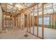 Spacious unfinished basement with wood framing, concrete floor, and insulation at 174 Pinewood Dr, Covington, GA 30014