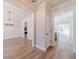 Dining room featuring wood flooring, chandelier, and decorative molding at 174 Pinewood Dr, Covington, GA 30014