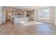 Bright kitchen featuring a central island, stainless appliances, and lots of natural light at 174 Pinewood Dr, Covington, GA 30014